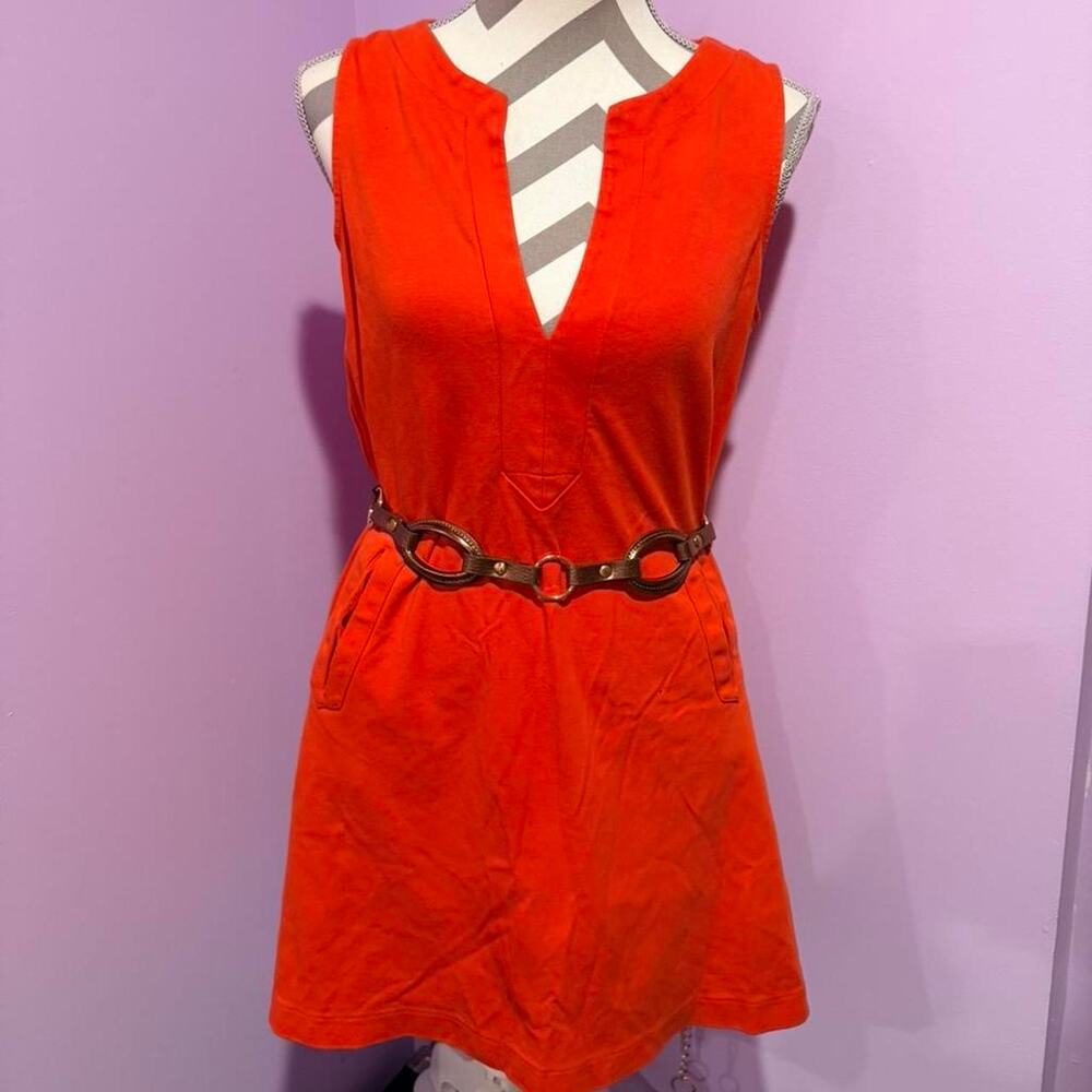 Orange mini dress with accentuated